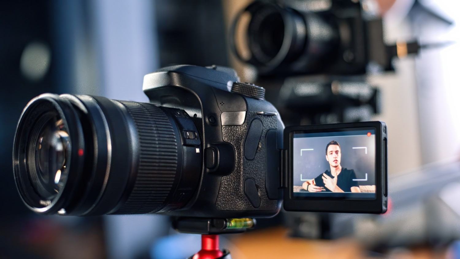 Videographer filming wedding vows with a stabilized cinema camera in Atlanta